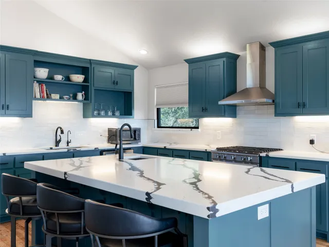 a view of a balcony with wooden floor