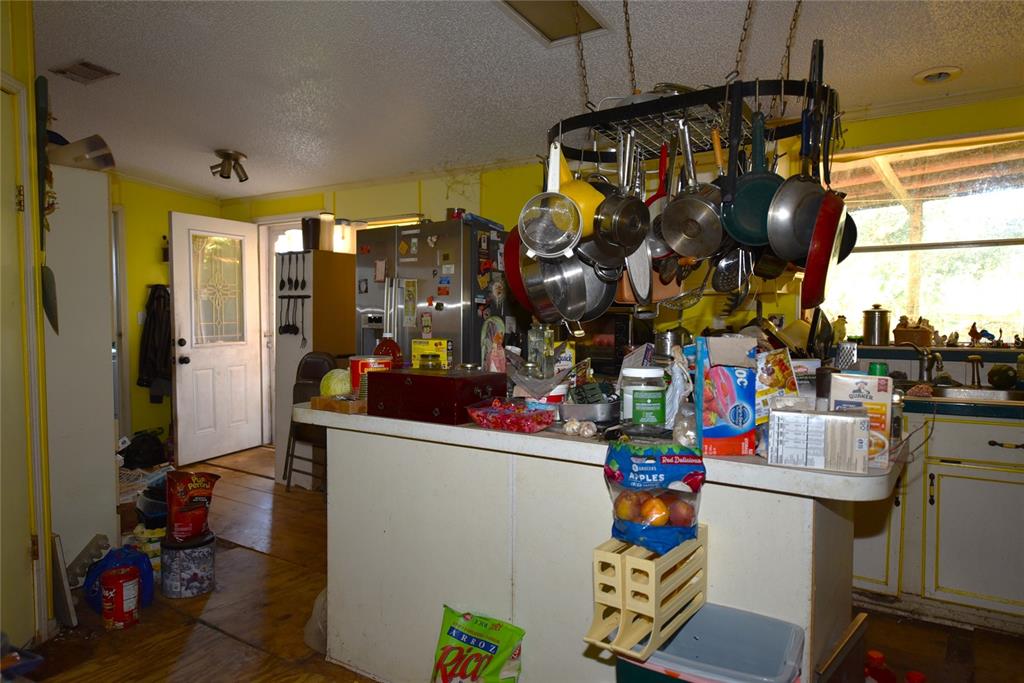 11542 Sumner Road Wimauma, FL 33598 - Photo 14 of 65 a view of a room with storage and utility
