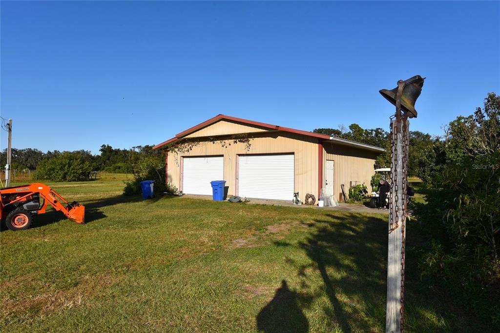 11542 Sumner Road Wimauma, FL 33598 - Photo 34 of 65 a view of a house with backyard and garden
