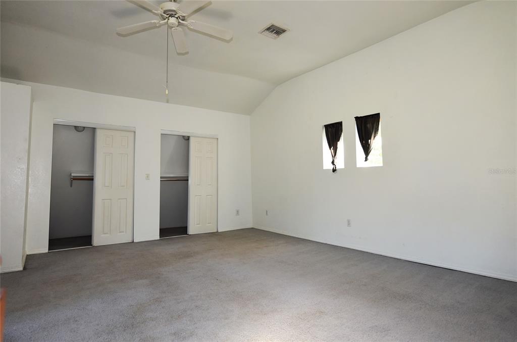 11542 Sumner Road Wimauma, FL 33598 - Photo 40 of 65 an empty room with fan