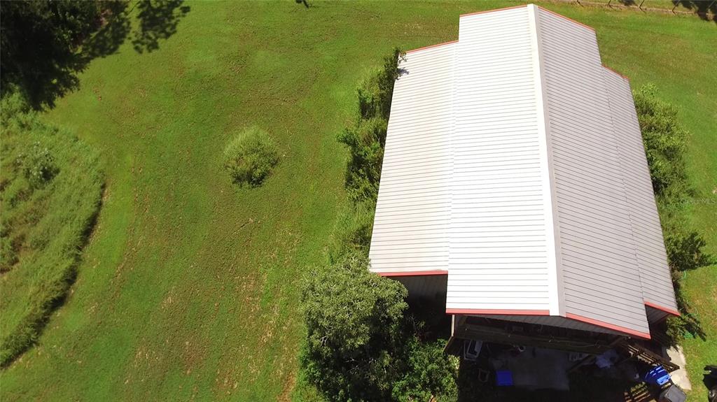 11542 Sumner Road Wimauma, FL 33598 - Photo 4 of 65 a view of a house with a backyard