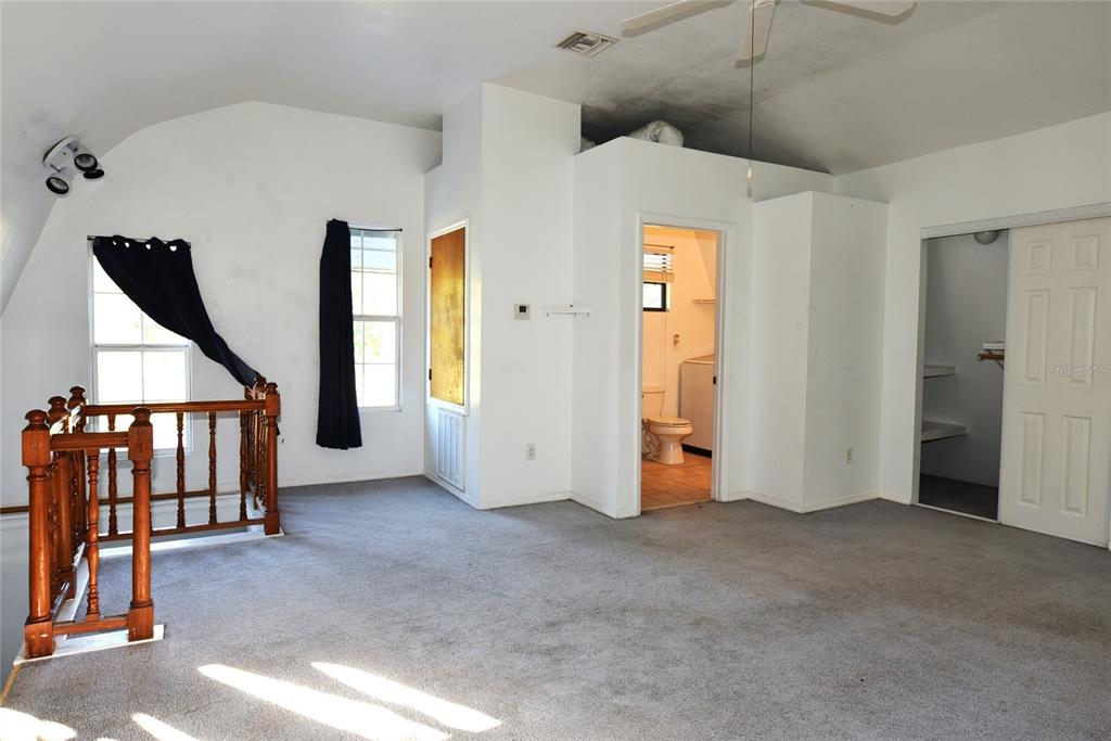 11542 Sumner Road Wimauma, FL 33598 - Photo 41 of 65 an empty room with windows