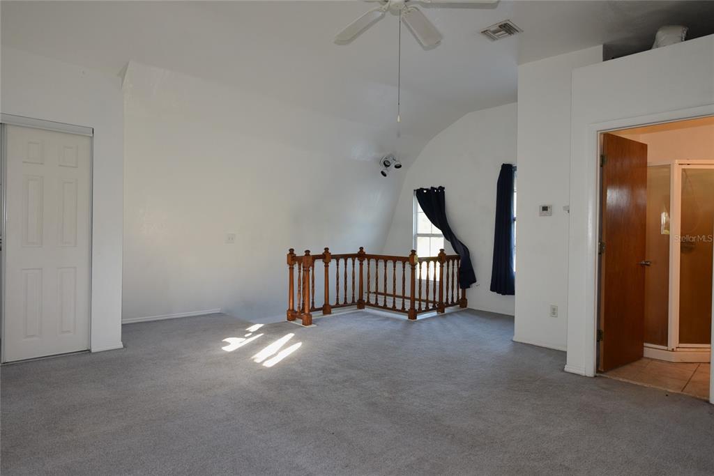 11542 Sumner Road Wimauma, FL 33598 - Photo 42 of 65 a view of a hallway with windows