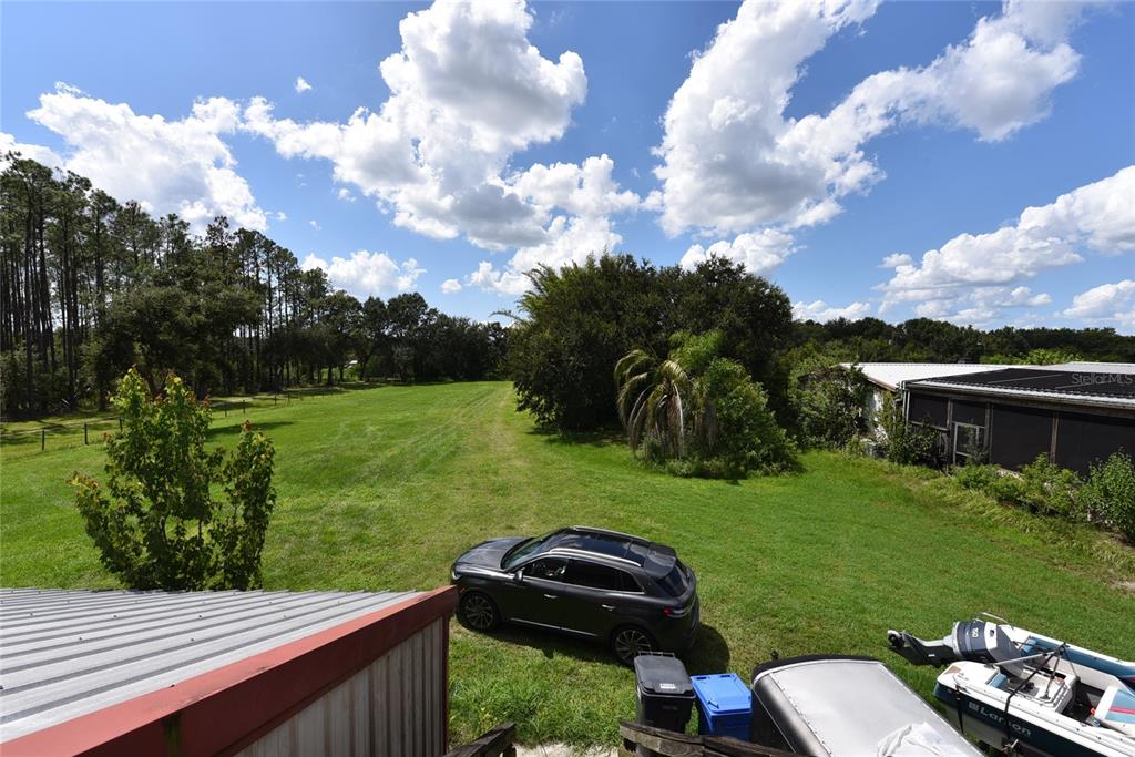 11542 Sumner Road Wimauma, FL 33598 - Photo 45 of 65 a view of a garden with houses
