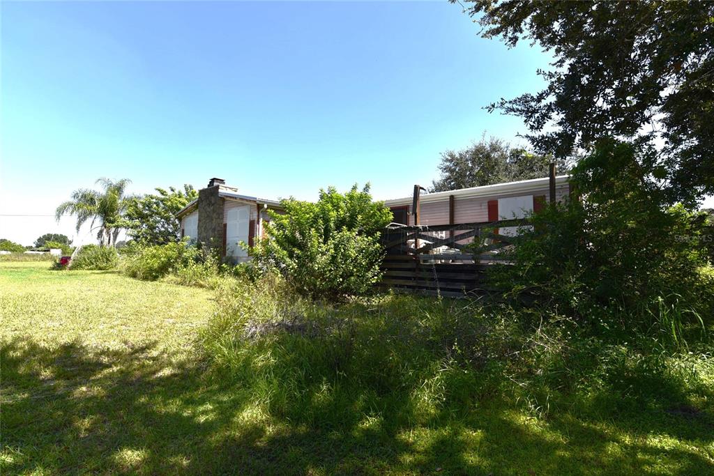 11542 Sumner Road Wimauma, FL 33598 - Photo 49 of 65 a view of a back yard