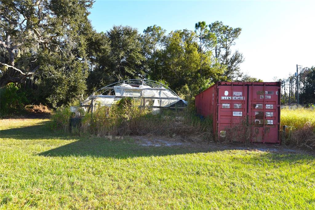 11542 Sumner Road Wimauma, FL 33598 - Photo 52 of 65 a view of a back yard of the house
