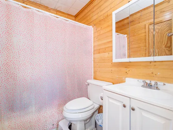 a bathroom with a sink and a toilet
