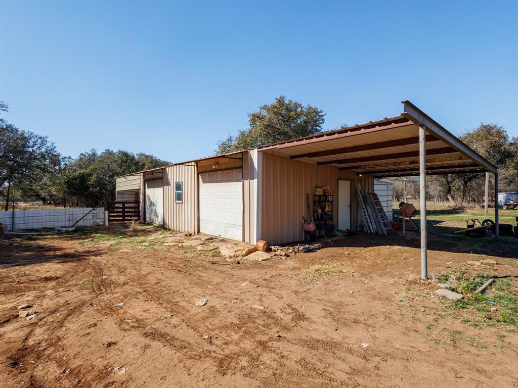 3301 County Road 339 Early, TX 76802 - Photo 31 of 39 a view of a house with a yard