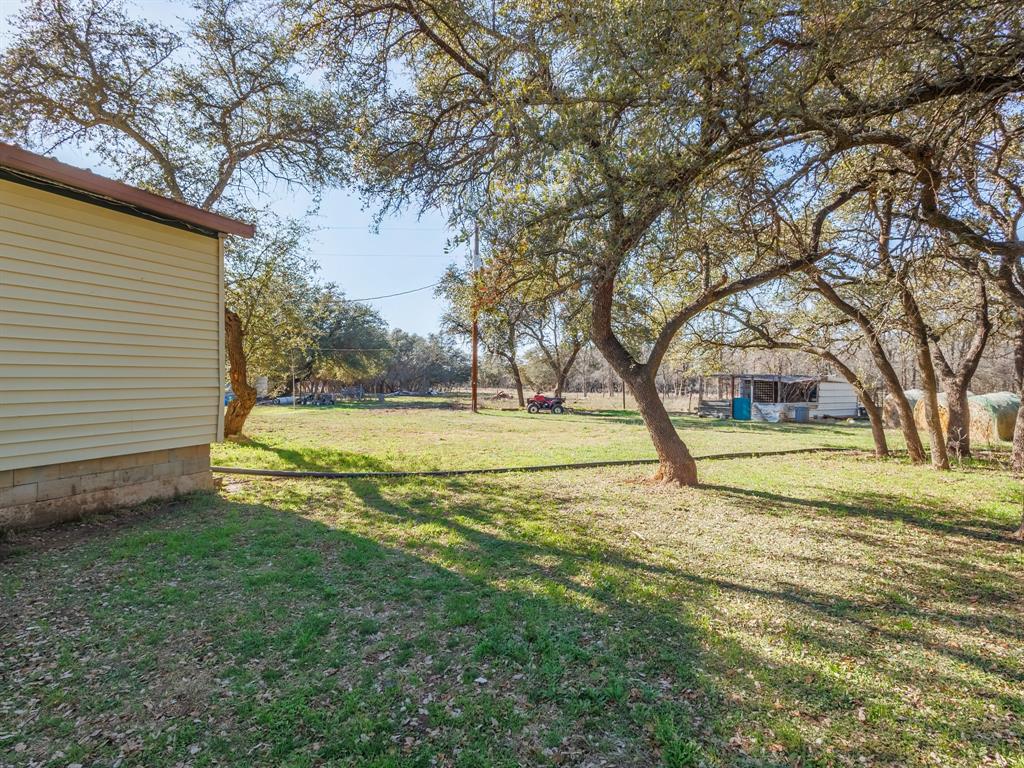 3301 County Road 339 Early, TX 76802 - Photo 34 of 39 a view of a house with a yard