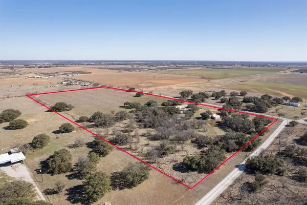 a view of a lake with a beach