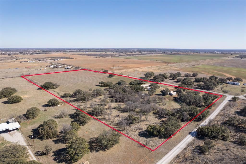 3301 County Road 339 Early, TX 76802 - Photo 35 of 39 a view of a lake with a beach
