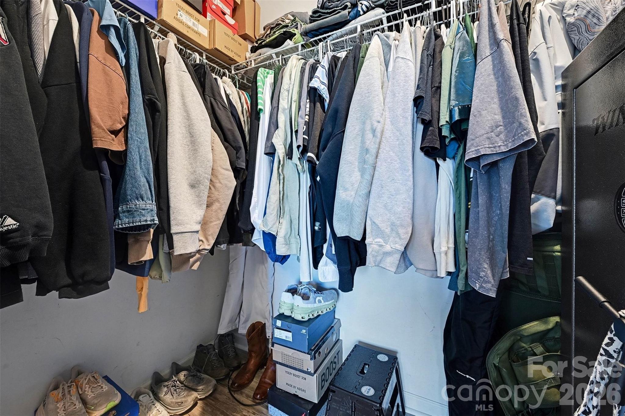 2268 Westbrook Road Edgemoor, SC 29712 - Photo 15 of 37 a view of walk in closet with clothes and shoes