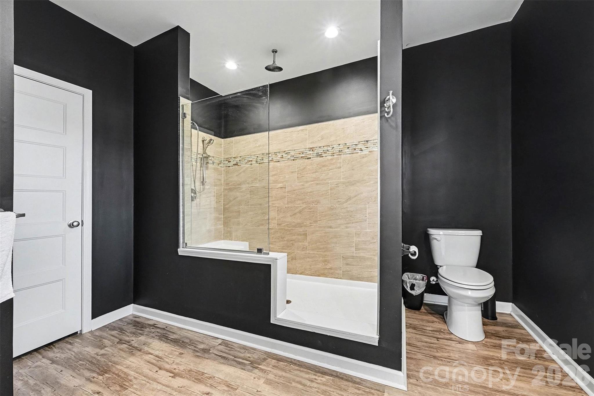 2268 Westbrook Road Edgemoor, SC 29712 - Photo 16 of 37 a bathroom with a toilet and a shower