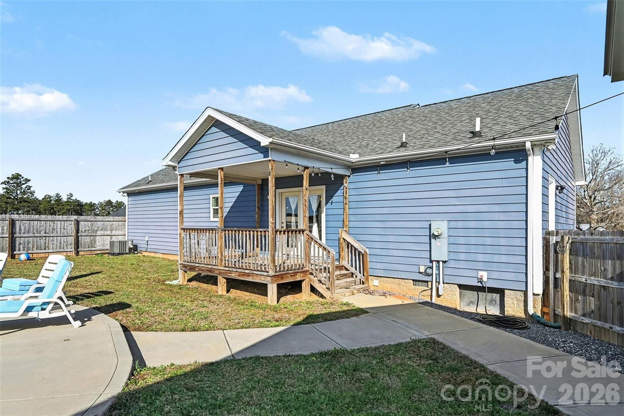 2268 Westbrook Road Edgemoor, SC 29712 - Photo 25 of 37 a view of house with backyard and seating area