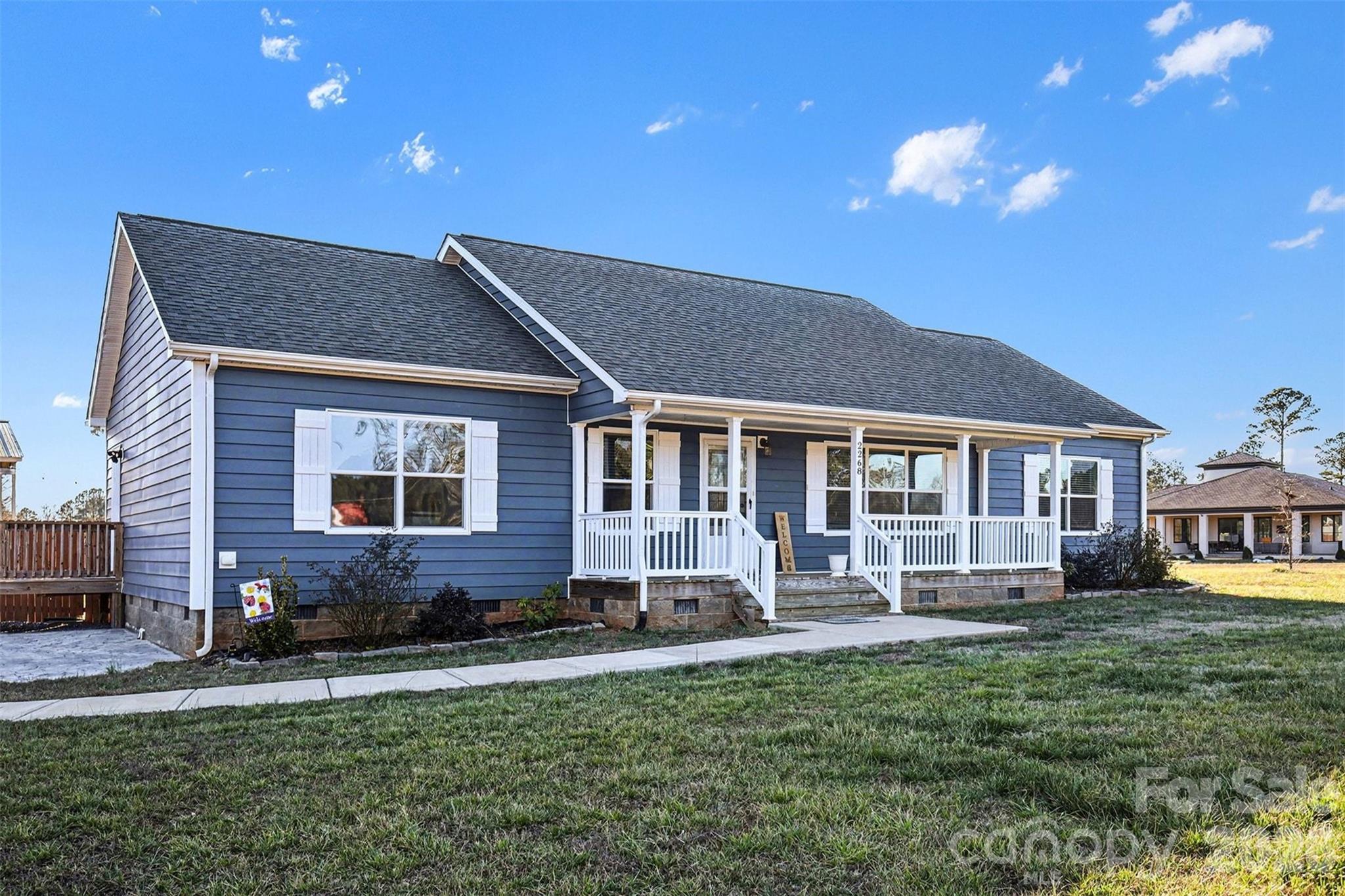2268 Westbrook Road Edgemoor, SC 29712 - Photo 4 of 37 a front view of a house with a yard