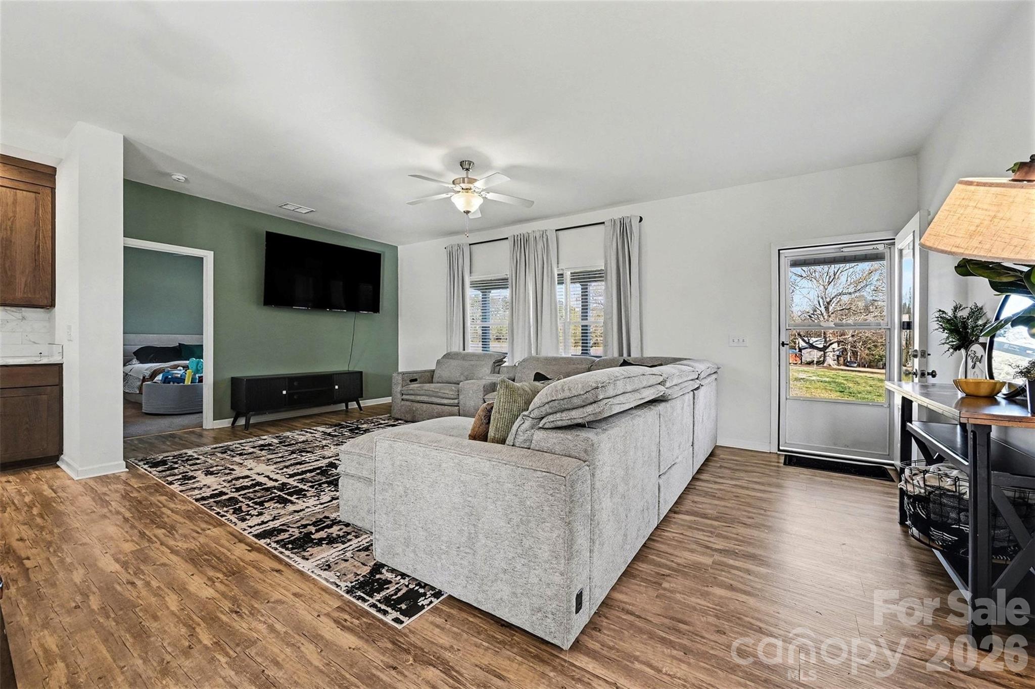 2268 Westbrook Road Edgemoor, SC 29712 - Photo 7 of 37 a large bedroom with a bed and a flat screen tv