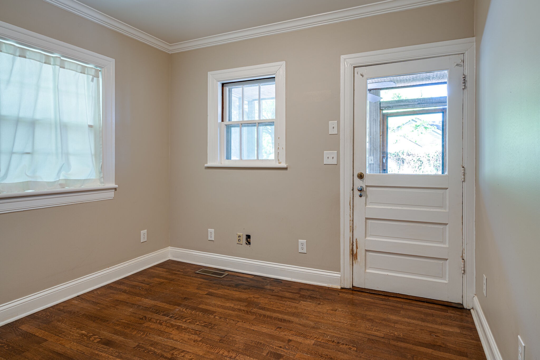 106 Winslow Road Franklin, TN 37064 - Photo 24 of 37 a view of an empty room with wooden floor and a window