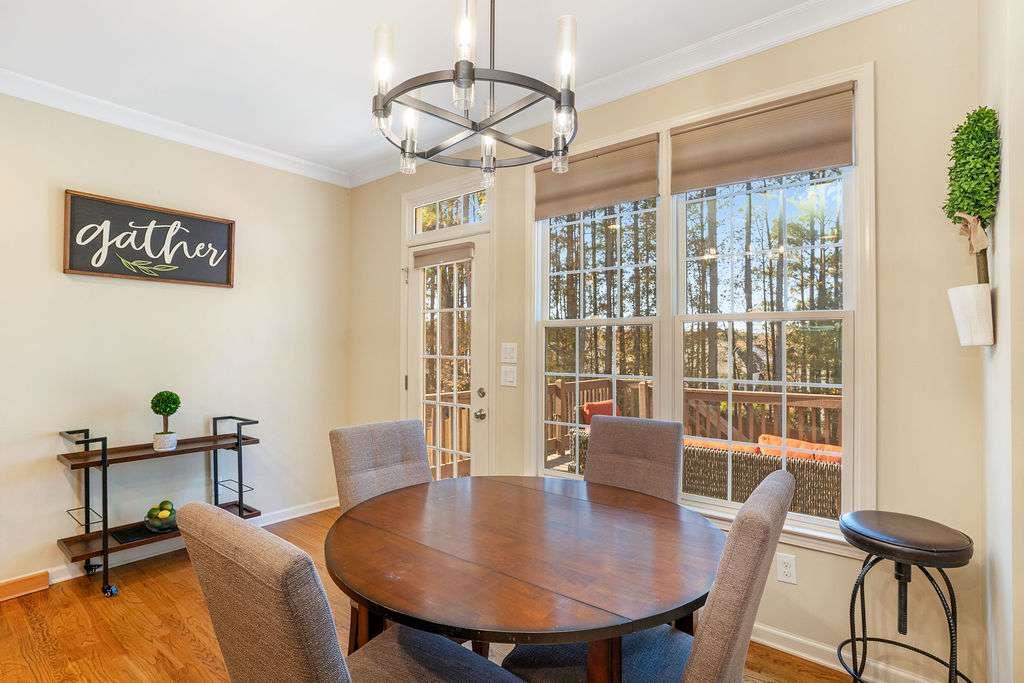 6463 Century Park Place Southeast Mableton, GA 30126 - Photo 15 of 42 a view of a dining room with furniture window and outside view