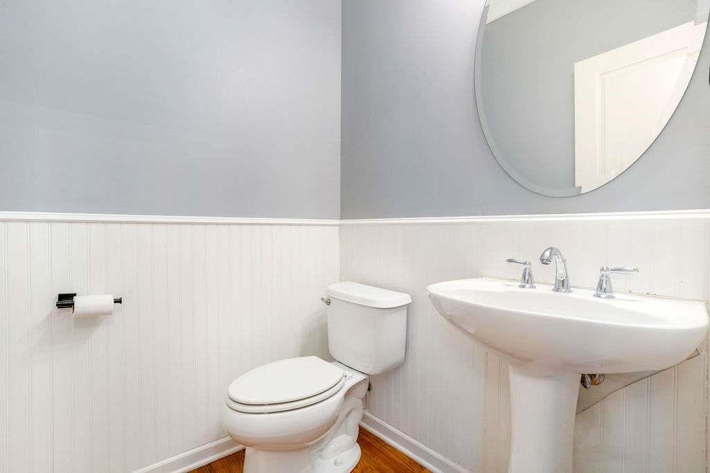 6463 Century Park Place Southeast Mableton, GA 30126 - Photo 19 of 42 a bathroom with a sink mirror and toilet