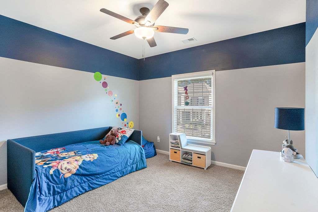 6463 Century Park Place Southeast Mableton, GA 30126 - Photo 28 of 42 a bedroom with furniture and a window