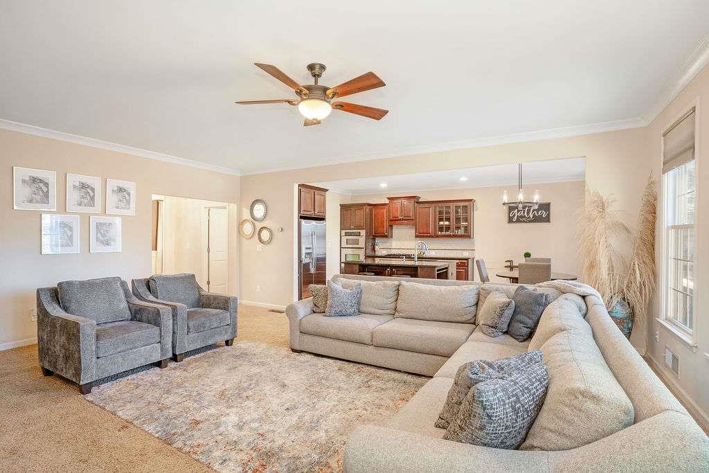 6463 Century Park Place Southeast Mableton, GA 30126 - Photo 9 of 42 a living room with furniture and a large window