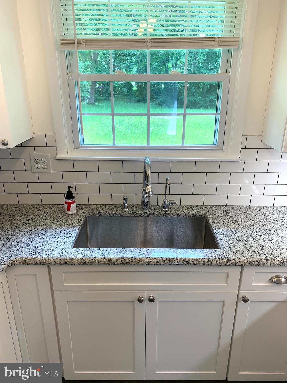 5715 Pindell Road Lothian, MD 20711 - Photo 11 of 25 Sink by the window