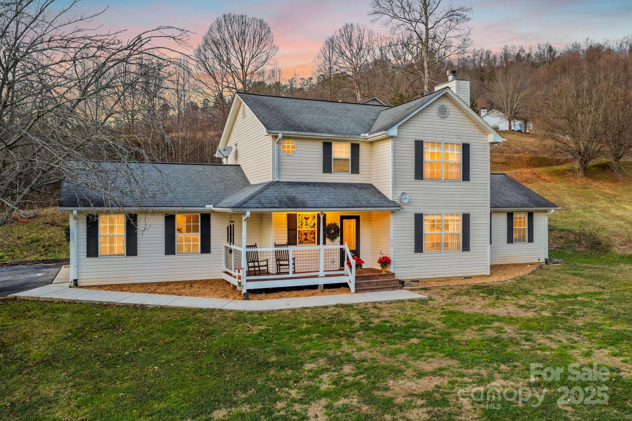 32 Wheat Ridge Road Sylva, NC 28779 - Photo 2 of 44 a front view of a house with a yard