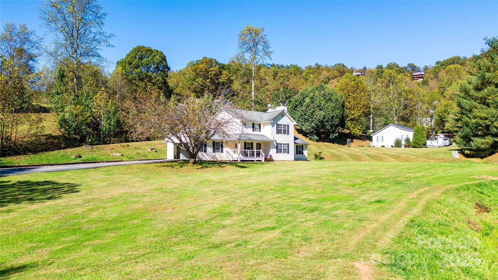 32 Wheat Ridge Road Sylva, NC 28779 - Photo 29 of 44 a front view of a house with a big yard