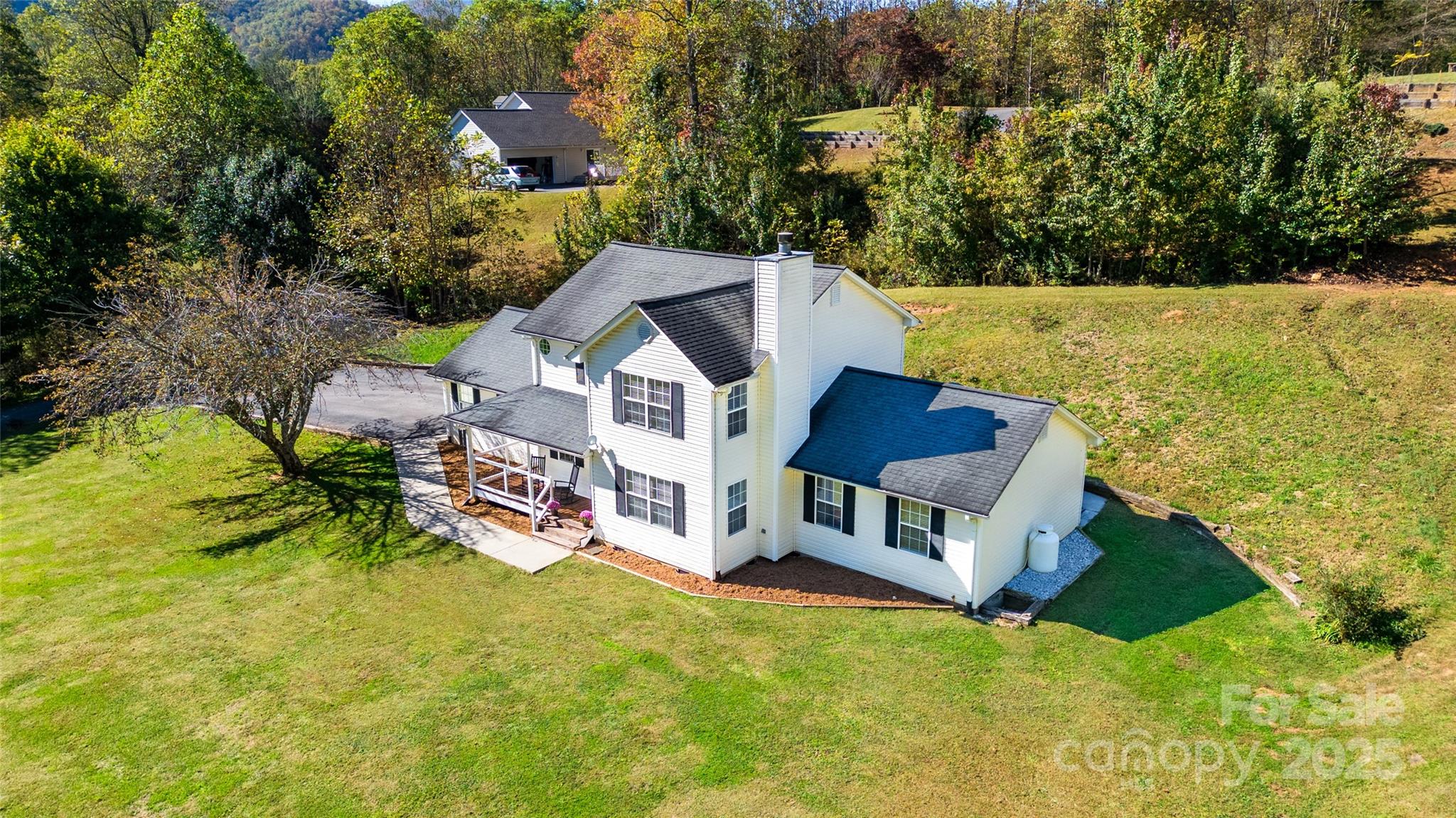 32 Wheat Ridge Road Sylva, NC 28779 - Photo 3 of 44 a view of house with a yard