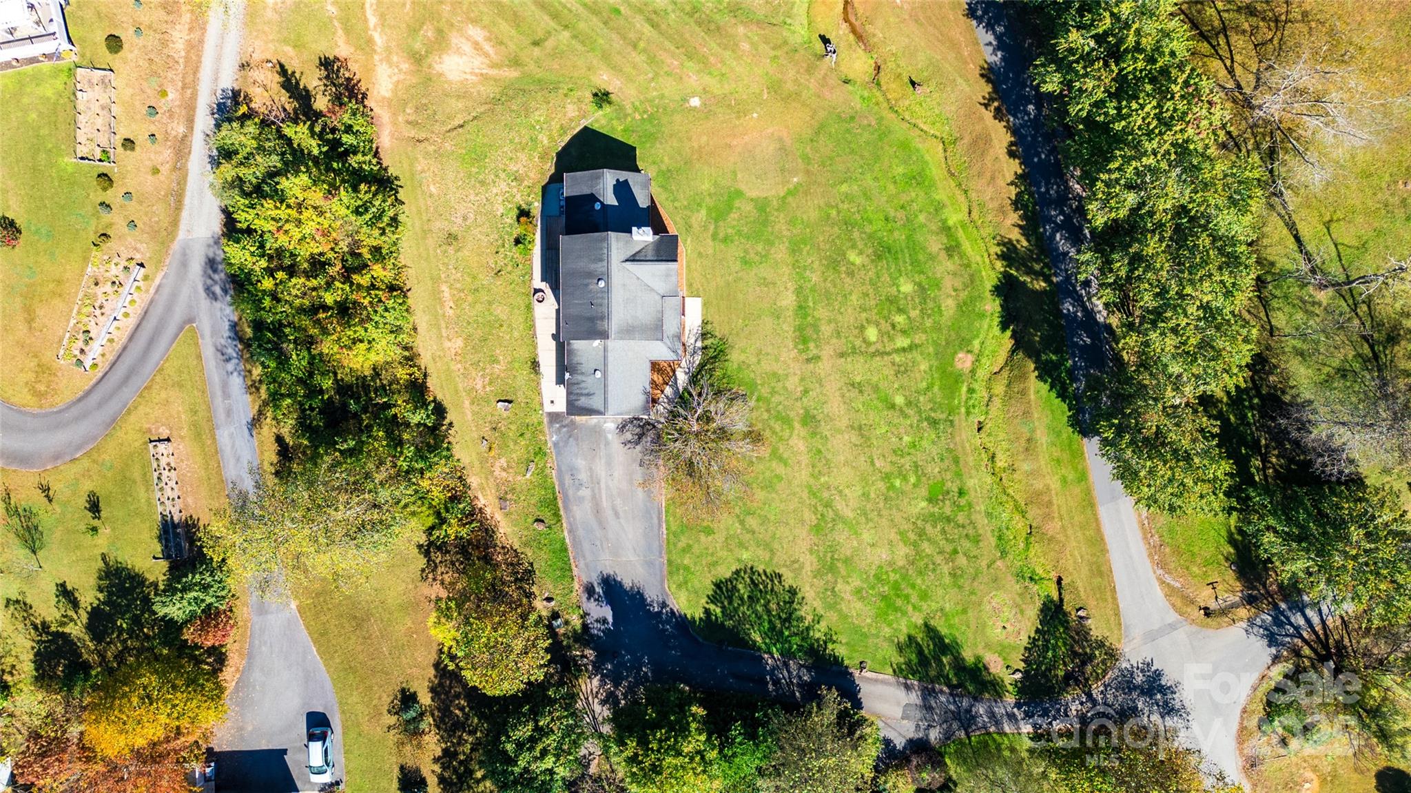 32 Wheat Ridge Road Sylva, NC 28779 - Photo 31 of 44 a view of a garden
