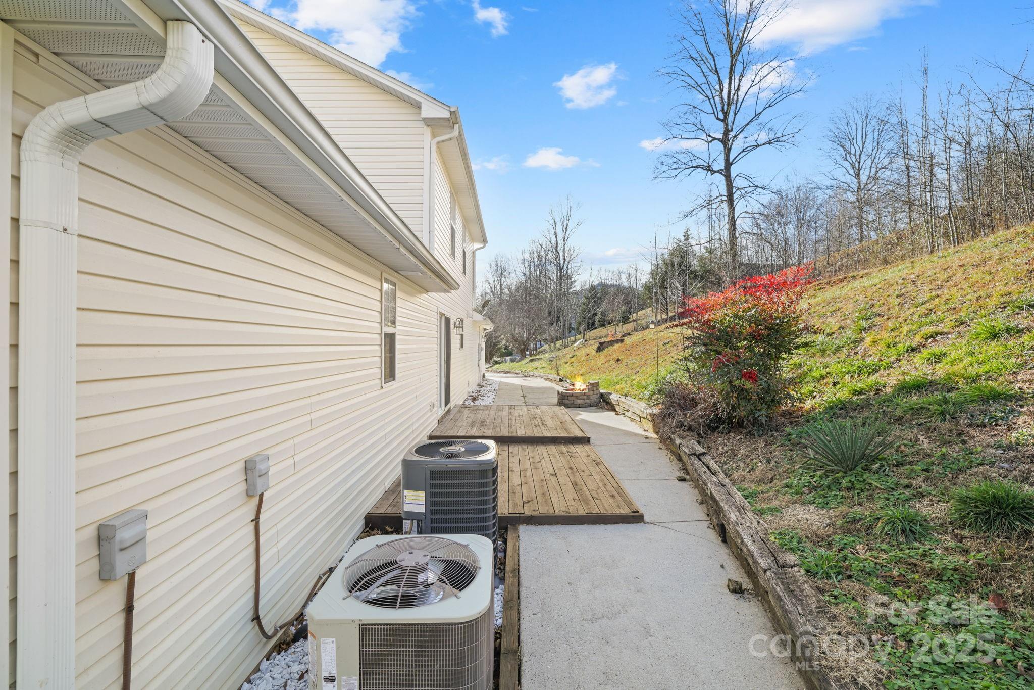 32 Wheat Ridge Road Sylva, NC 28779 - Photo 35 of 44 a view of a backyard with pathway