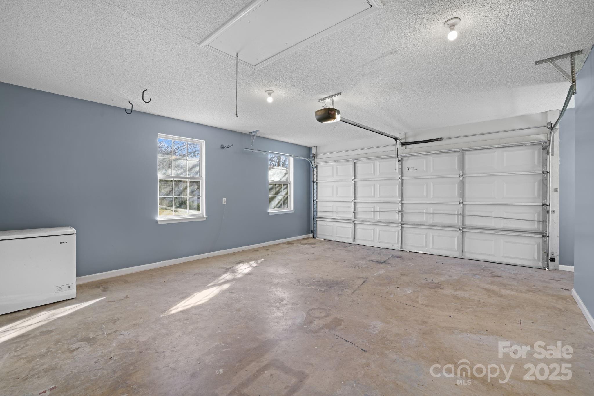 32 Wheat Ridge Road Sylva, NC 28779 - Photo 36 of 44 an empty room with windows and closet