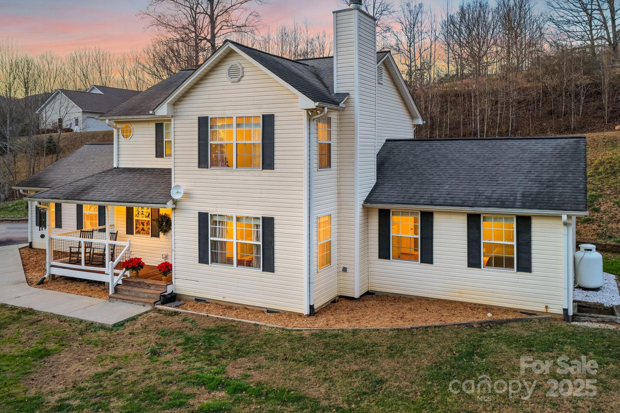 32 Wheat Ridge Road Sylva, NC 28779 - Photo 41 of 44 a front view of a house with a yard