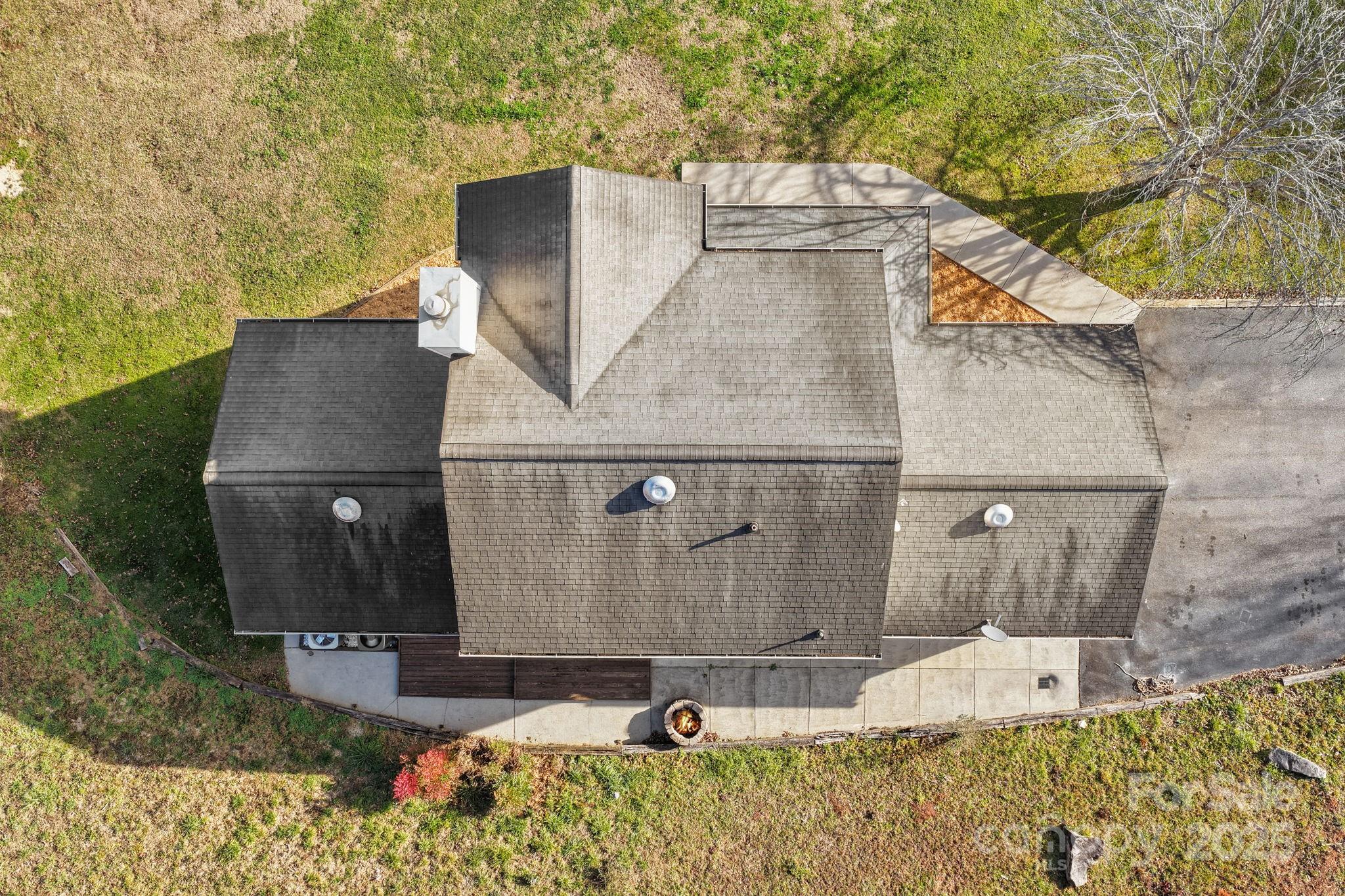 32 Wheat Ridge Road Sylva, NC 28779 - Photo 43 of 44 an aerial view of a house with a yard
