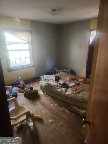 a bedroom with a bed