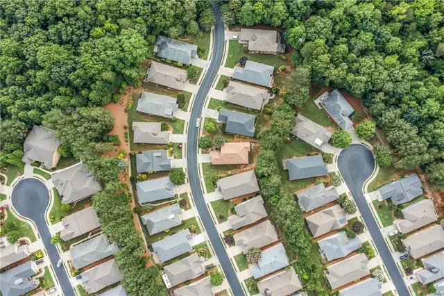a view of an chairs and table in the patio