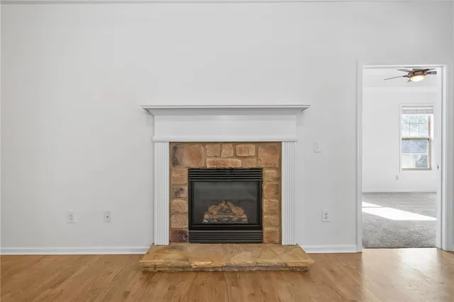 a living room with a fireplace