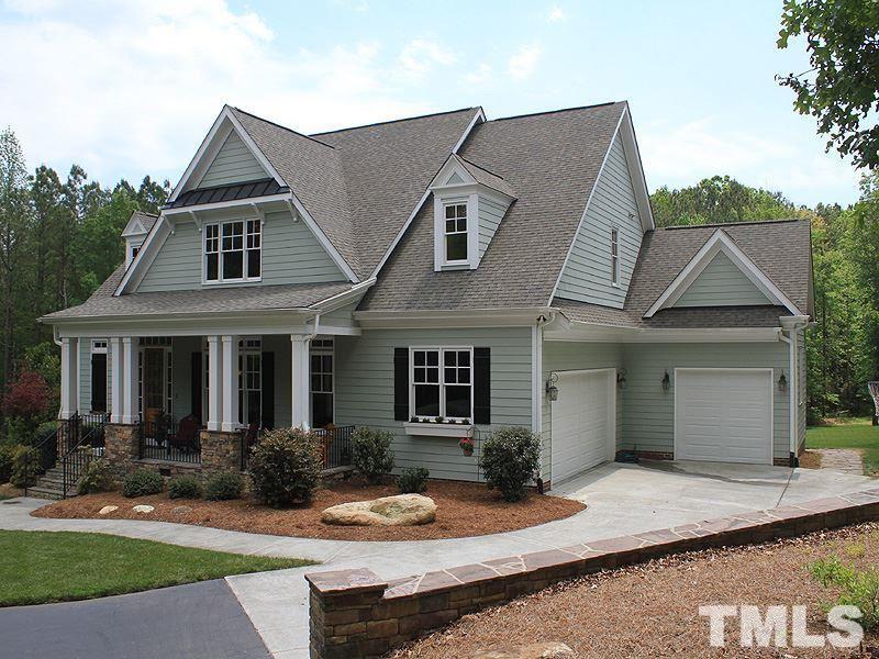 1305 Mason Road Durham, NC 27712 - Photo 2 of 25 a front view of a house with a yard
