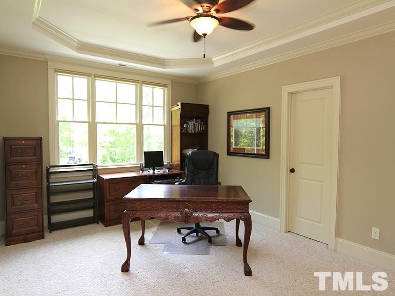 1305 Mason Road Durham, NC 27712 - Photo 18 of 25 a view of a workspace with furniture and a window