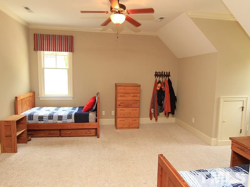 1305 Mason Road Durham, NC 27712 - Photo 20 of 25 a living room with furniture gym equipment and a window