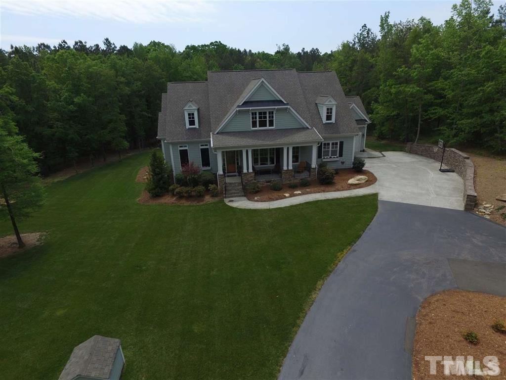 1305 Mason Road Durham, NC 27712 - Photo 3 of 25 an aerial view of a house with swimming pool and garden