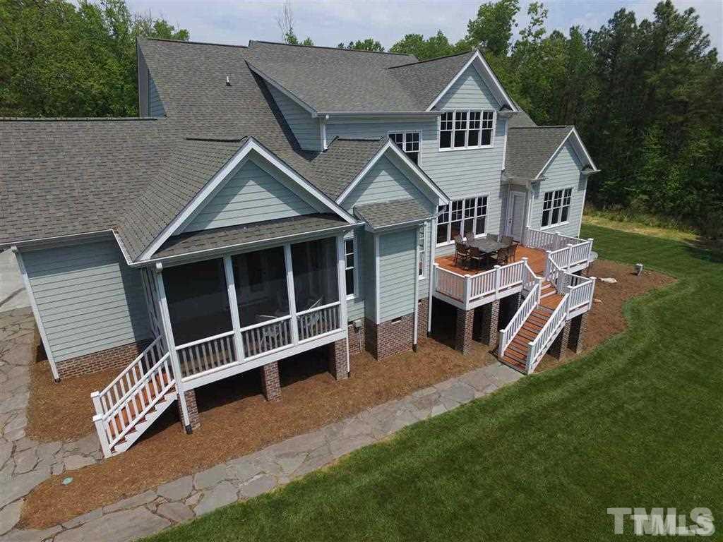 1305 Mason Road Durham, NC 27712 - Photo 24 of 25 a view of a house with a yard and balcony