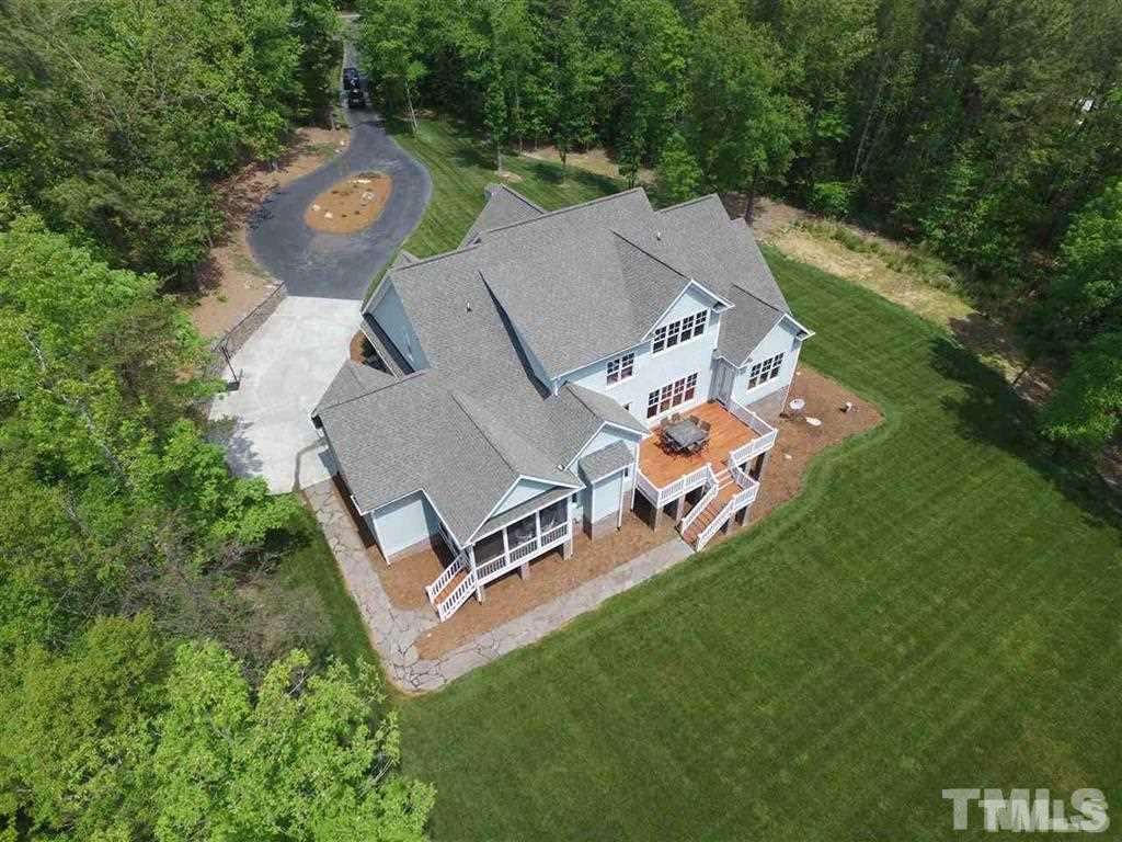 1305 Mason Road Durham, NC 27712 - Photo 4 of 25 an aerial view of a house with outdoor space pool seating area and yard