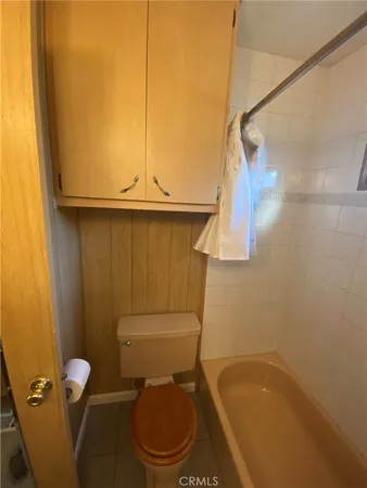 a bathroom with a toilet and a sink