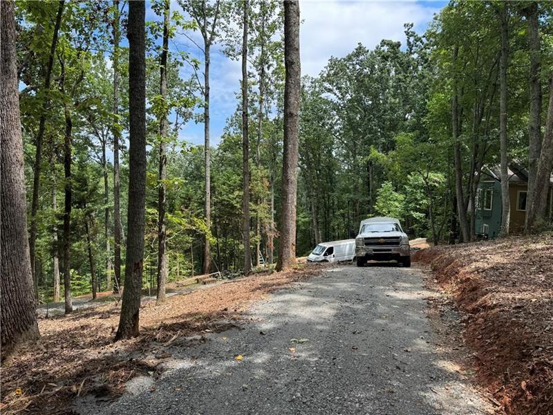0 Bethel Road Gainesville, GA 30506 - Photo 5 of 15 a view of a house with truck parked next to a road