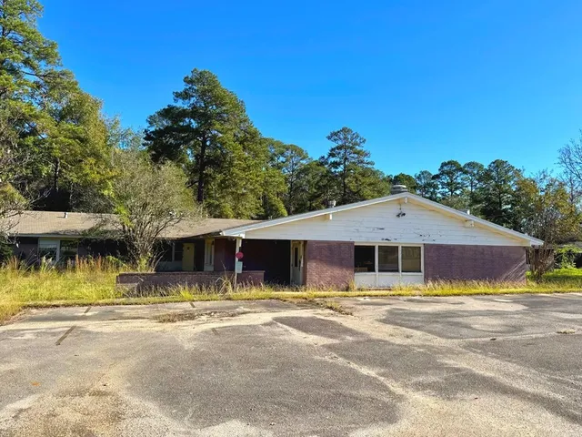 a view of a house with a swimming pool