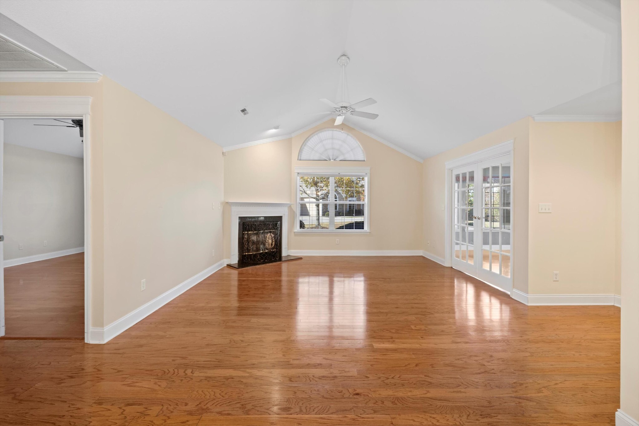 2457 Baskette Way Chattanooga, TN 37421 - Photo 12 of 24 a view of an empty room with window and wooden floor