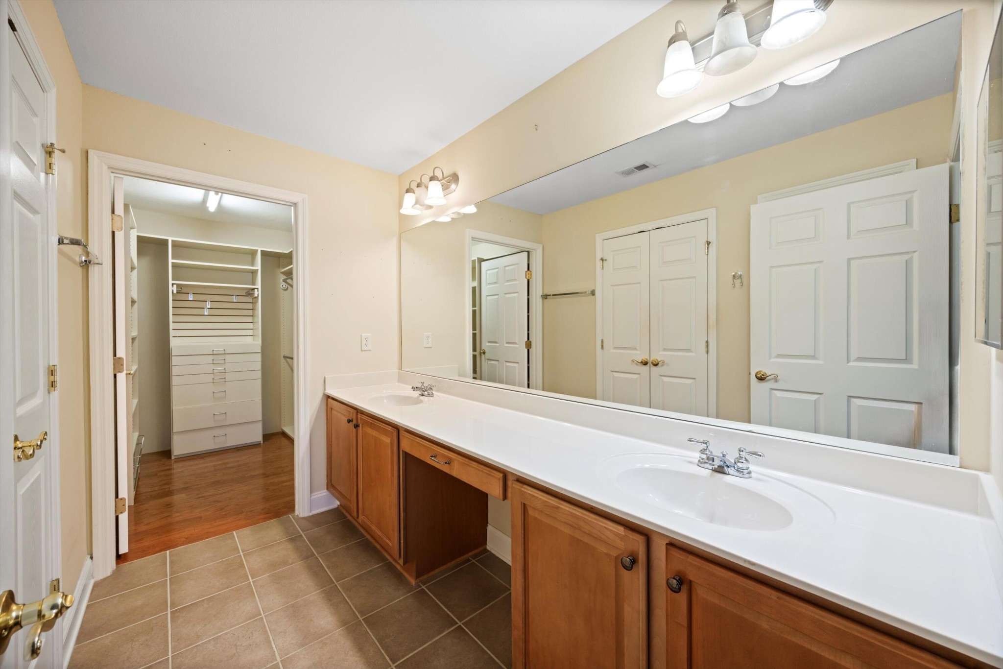 2457 Baskette Way Chattanooga, TN 37421 - Photo 17 of 24 a bathroom with a sink double vanity and a mirror