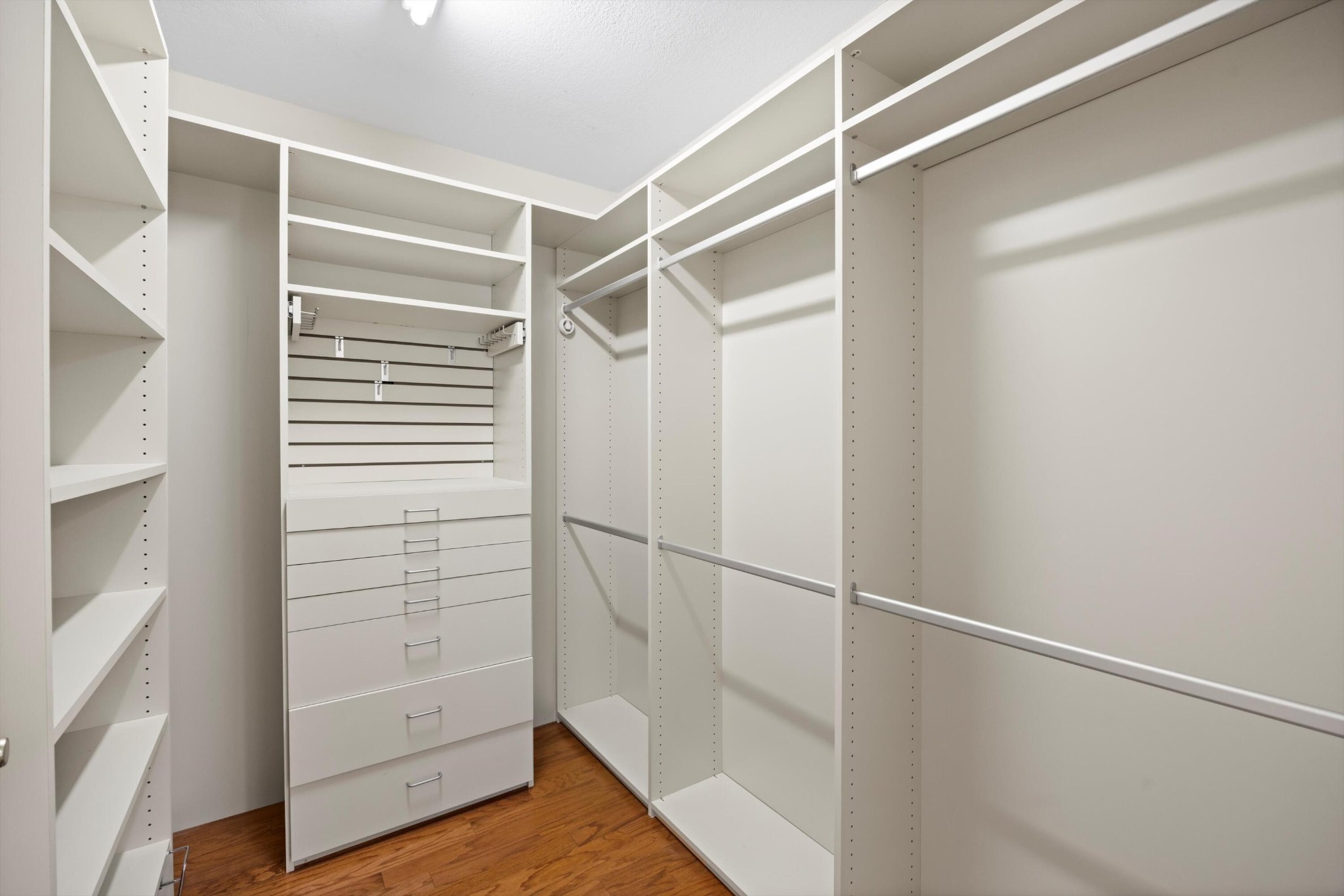 2457 Baskette Way Chattanooga, TN 37421 - Photo 18 of 24 a view of walk in closet with empty racks