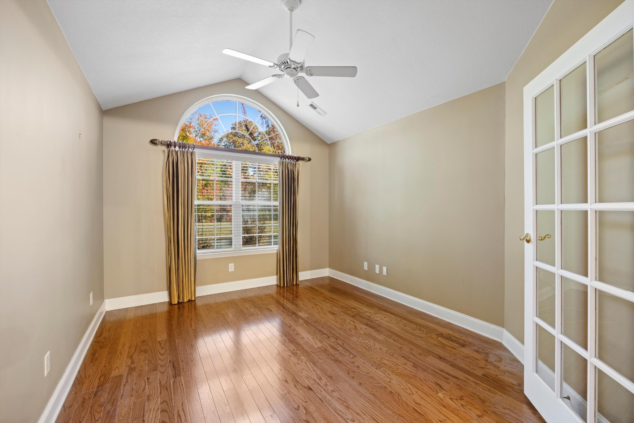 2457 Baskette Way Chattanooga, TN 37421 - Photo 20 of 24 wooden floor in an empty room with a window